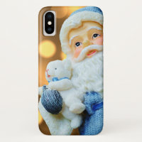 Papá Noel en un traje azul