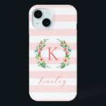 Funda Para iPhone 15 Paraíso Floral y franjas rosadas Monograma<br><div class="desc">Este divertido diseño de moda presenta un fondo de rayas blancas y rosas con una colorida corona floral. Personalice el diseño con su nombre y monograma u otro texto. Utilice las herramientas de diseño para elegir cualquier color de fondo, editar los tipos de letra y colores del texto o cargar...</div>