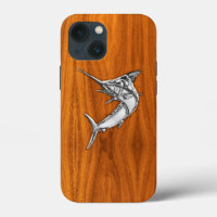 Pescado cromado de marlin en la imprenta de teca