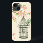 Funda Para iPhone 13 Small Birds Perched on a Branch and on a Birdcage<br><div class="desc">Nancy Slocum's have painted many birds throughout the years. This image portrays two small blue and yellow birds perched on a branch surrounded by pink flowers and looking curious about a birdcage. Get this cool bird-themed art piece on your Zazzle product today.</div>