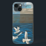 Funda Para iPhone 13 Tres gaviotas blancas volando sobre el agua<br><div class="desc">¿Necesitas escapar? Hazlo eligiendo este cuadro de la artista Tara Friel que representa a tres gaviotas que sobrevuelan el agua. La vista de las olas del océano y los vivos colores hacen que este diseño sea muy realista.</div>