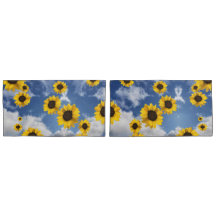 Cielo de nubes y girasoles