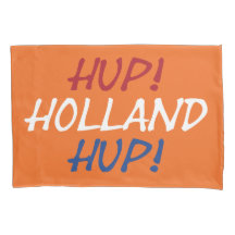Hup Holland colgado sobre la bandera de la NLD en