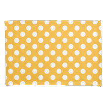 Pos de polka blanca sobre amarillo