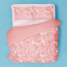 Hojas tropicales de palma rosada con luz femenina