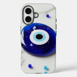 Funda iPhone 16 Blue Evil Eye Amulet on White Marble Surface