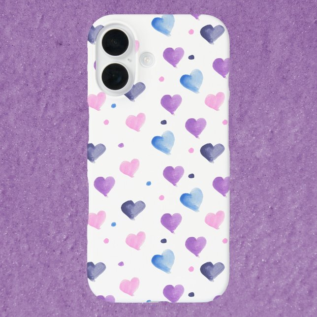 Funda iPhone 16 Patrón de acuarela Azul rosa Púrpura (A phone case with a pattern of pink, blue and purple watercolor hearts and dots.)