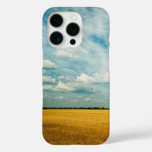 Funda iPhone 16 Pro Campo de trigo dorado y cielo azul nublado