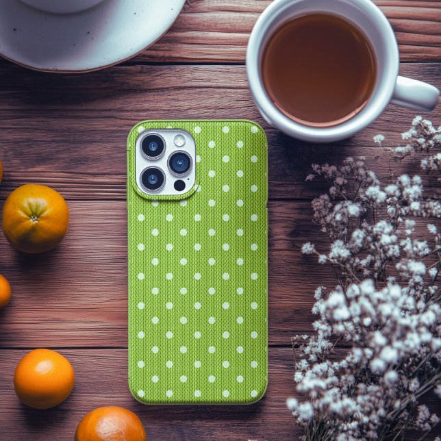 Funda iPhone 16 Pro Dotty Delight Green (A Dotty Delight Green Case-Mate iPhone Case is on the table. )