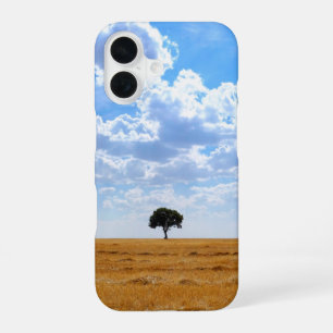 Funda Para iPhone 16 Árbol en un campo de trigo cosechado