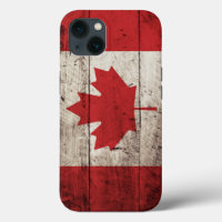 Bandera de Canadá en viejo grano de madera