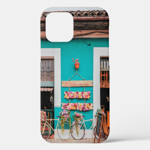 FUNDA PARA iPhone 12 BICICLETA BLANCA APARCADA JUNTO A CONCRETO PINTADO