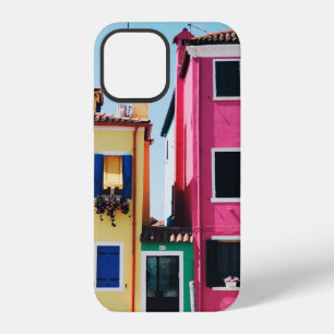 FUNDA PARA iPhone 12 CASAS DE HORMIGÓN AMARILLAS Y ROSADAS DURANTE EL D