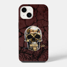 Funda de iPhone negra y dorada con calavera grunge