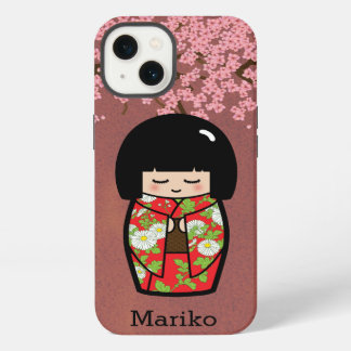 Muñeca japonesa kokeshi en Kimono rojo con Sakura