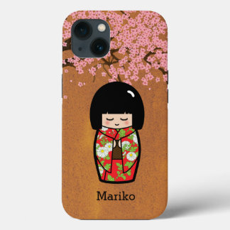 Muñeca japonesa kokeshi en Kimono rojo con Sakura
