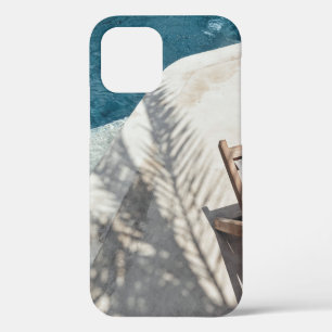 Funda Para iPhone 12 Reposera de madera marrón cerca del cuerpo de agua