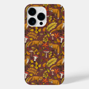 Funda Para iPhone 14 Pro Max zorros otoñales sobre marrón chocolate