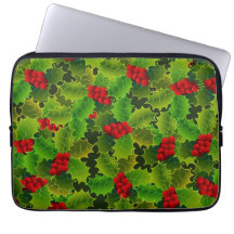 Acebo verde con bayas rojas