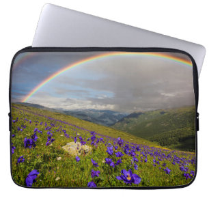 Funda Para Portátil Arco iris sobre un prado floreciente