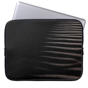 FUNDA PARA PORTÁTIL ARENA GRIS EN FOTOGRAFÍA DE CHIAROSCURO