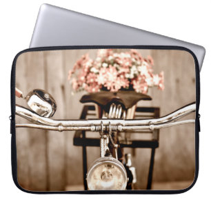 Funda Para Portátil Bicicleta antigua y flores se desdibujan en el pro