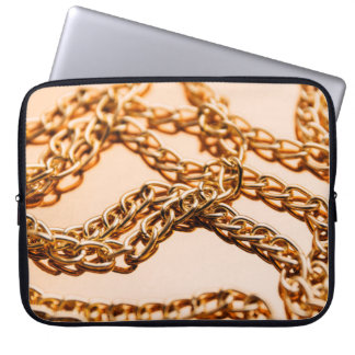 Funda Para Portátil Cadenas doradas brillantes en la superficie reflec