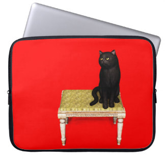 Funda para portátil con gato negro en el taburete