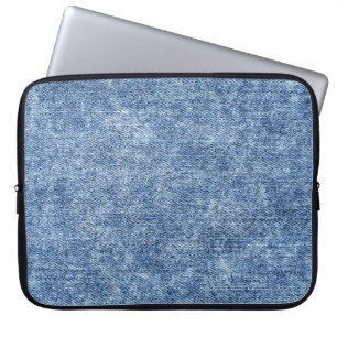 Funda Para Portátil Denim azul de lavado con ácido, textura de cierre.