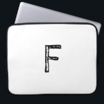 Funda Para Portátil lettero<br><div class="desc">Nuestra manga portátil es el accesorio perfecto para proteger su equipo mientras está de viaje. Fabricado con material duradero y resistente al agua, mantendrá su portátil a salvo de derrames, arañazos y otros daños. El exterior de la manga es de color blanco, lo que proporciona el lienzo perfecto para su...</div>