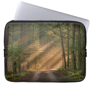 Funda Para Portátil Luz del sol que brilla a través de un bosque