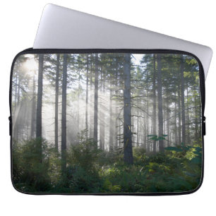 Funda Para Portátil Luz del sol que se rompe a través de un bosque