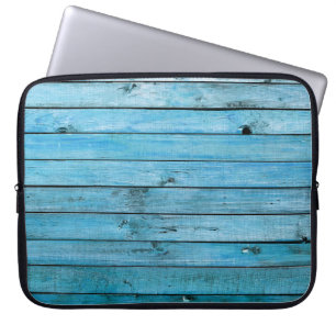Funda Para Portátil Madera natural azul, fondo texturado.