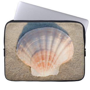Funda Para Portátil Mar Shell que pone en la playa de Sandy