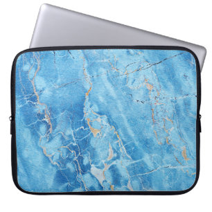 Funda Para Portátil Marble Elegance: Superficie texturada natural.