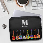 Funda Para Portátil Monograma de guitarra colorida<br><div class="desc">Ilustraciones de guitarra eléctrica, acústica y semiacústica funky psicodélico colorido con monograma personalizado y plantilla de nombre. Cualquier guitarrista o músico te dirá que nunca puedes tener muchas guitarras. Este divertido y colorido diseño de guitarra celebra la energía y variedad de este maravilloso instrumento musical. El regalo perfecto para guitarristas,...</div>