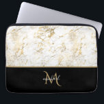 Funda Para Portátil Monograma de oro y mármol negro Elegante lujo<br><div class="desc">Diseño clásico y elegante con oro negro y mármol con monograma. La plantilla se ha configurado para que sólo tenga que agregar su nombre para completar el diseño. Accesorios similares en la tienda.</div>