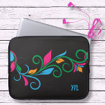 Funda Para Portátil Monograma defloral<br><div class="desc">Esta bolsa colorida para el portátil o la funda del comprimido está lista para su propio monograma. Creado en un audaz y colorido patrón de borde de hoja giratoria con brillantes salpicaduras de color sobre negro. Simplemente edite su letra de monograma. Su elección de varios tamaños.</div>