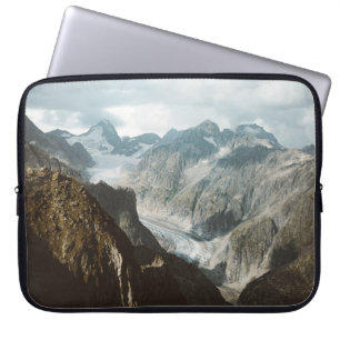 FUNDA PARA PORTÁTIL MONTAÑAS CUBIERTAS DE NIEVE DURANTE EL DÍA