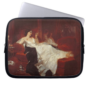 Funda Para Portátil Mujer en un sofá rojo