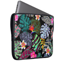 Patrón de hojas y flores tropicales vibrantes