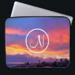Funda Para Portátil Personalizado fotográfico amarillo rosa azul atard<br><div class="desc">Escriba la letra en monograma de su elección y "haga su propia magia" cada vez que utilice esta impresionante manga de neopreno fotográfica compuesta por una puesta de sol dramáticamente iluminada en azul, rosa, naranja y amarillo. Esta funda portátil tiene tres tamaños: 15", 13" y 10". Hace un gran regalo...</div>