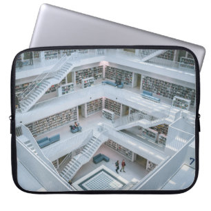 FUNDA PARA PORTÁTIL PERSONAS CAMINANDO DENTRO DE LA BIBLIOTECA