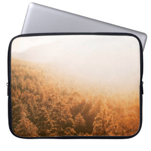 FUNDA PARA PORTÁTIL SOL DE ORO SOBRE UN BOSQUE