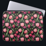 Funda Para Portátil Tulipán floral rosa y roja<br><div class="desc">Esta bolsa de ordenador portátil de tela tiene un diseño con flores de tulipán rosadas y rojas vibrantes sobre un fondo negro oscuro. Las frondosas hojas de tulipán verde añaden contraste, aportando un fresco toque de color al fondo oscuro. Este audaz patrón floral exuda elegancia y sofisticación y es perfecto...</div>