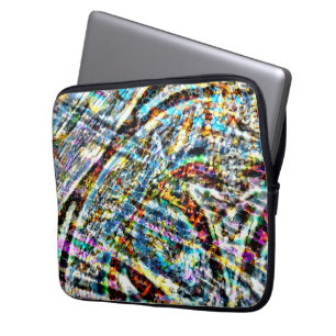 Funda Para Portátil Un desorden colorido con parches de colores vivos