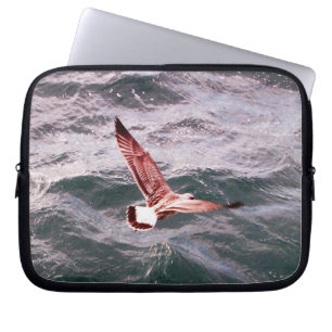 FUNDA PARA PORTÁTIL VOLANDO SEAGULL SOBRE LAS OLAS