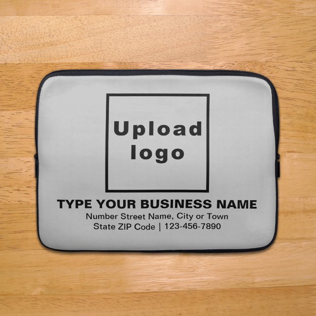 Funda para portátiles gris de marca comercial (Your business brand on gray laptop sleeve.)