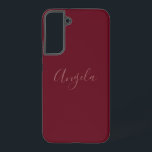 Funda Para Samsung Galaxy S22  Borgoña otoñal con un juego de nombres o monograma<br><div class="desc">Este estuche de teléfono presenta un nombre rosado,  un conjunto de monogramas o iniciales en un tipo de letra con estilo guiñado florido en un fondo borgoñado de otoño.</div>
