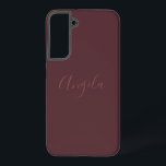 Funda Para Samsung Galaxy S22  Borgoña quemada con un juego de nombres o monogram<br><div class="desc">Este estuche de teléfono presenta un nombre pálido,  un conjunto de monogramas o iniciales en un tipo de letra de estilo guiñado con flores en un fondo borgoñado quemado.</div>